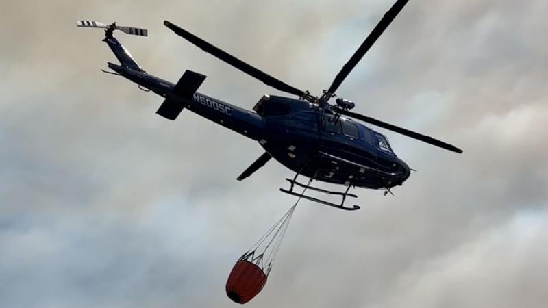 Carolinas wildfires battle helped by rain